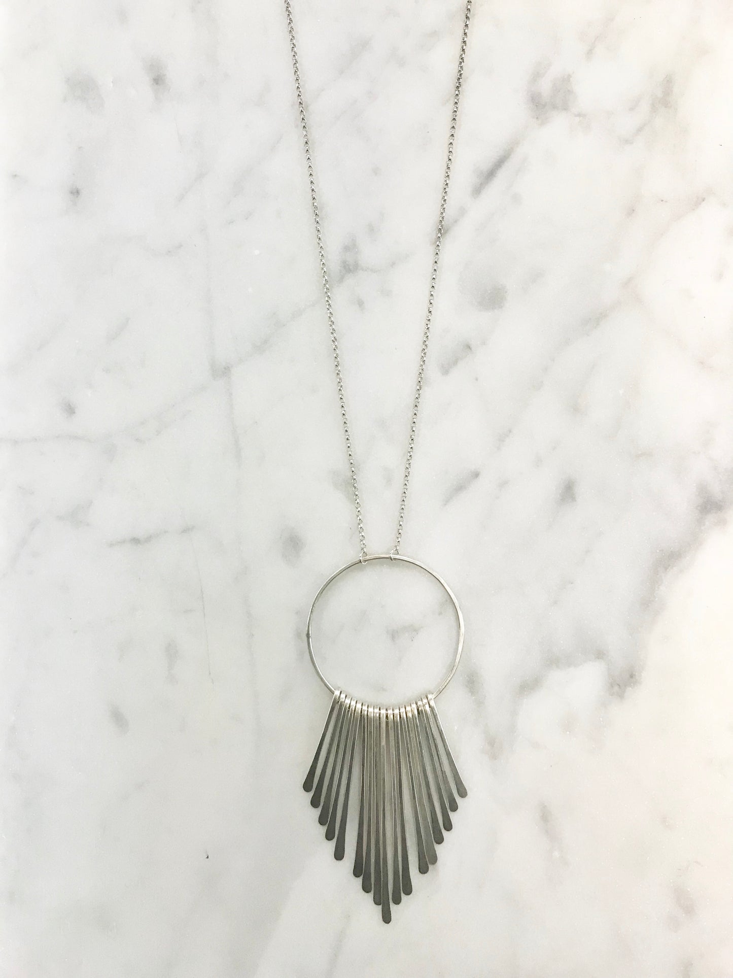 Large radiant fringe necklace