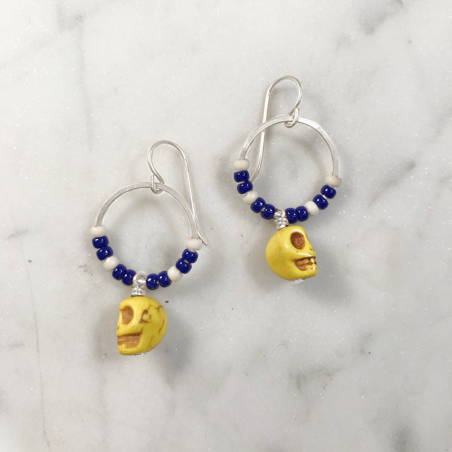 Yellow skull earrings
