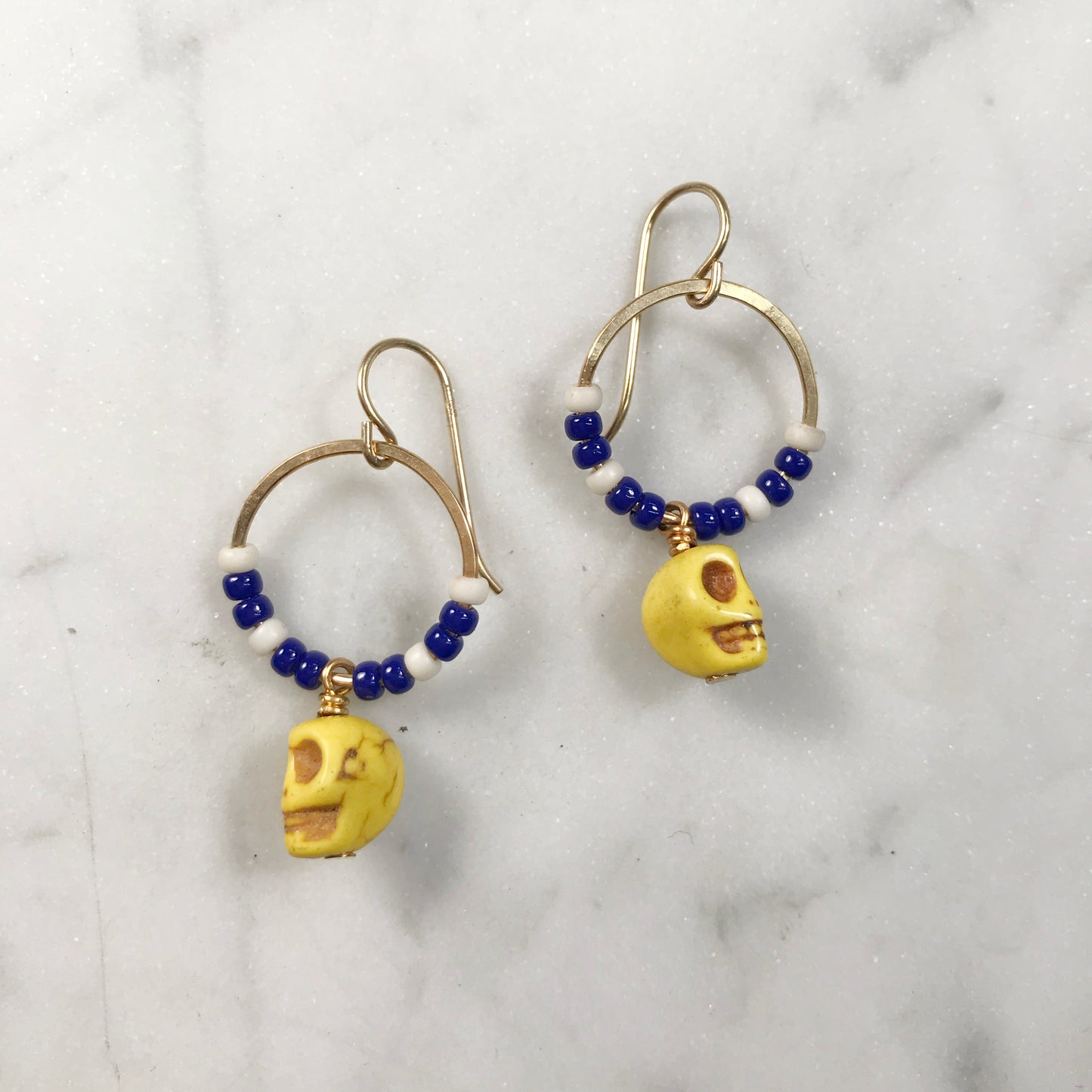 Yellow skull earrings