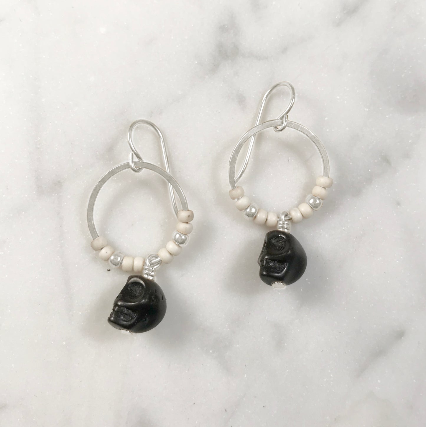 Black howlite skull earrings