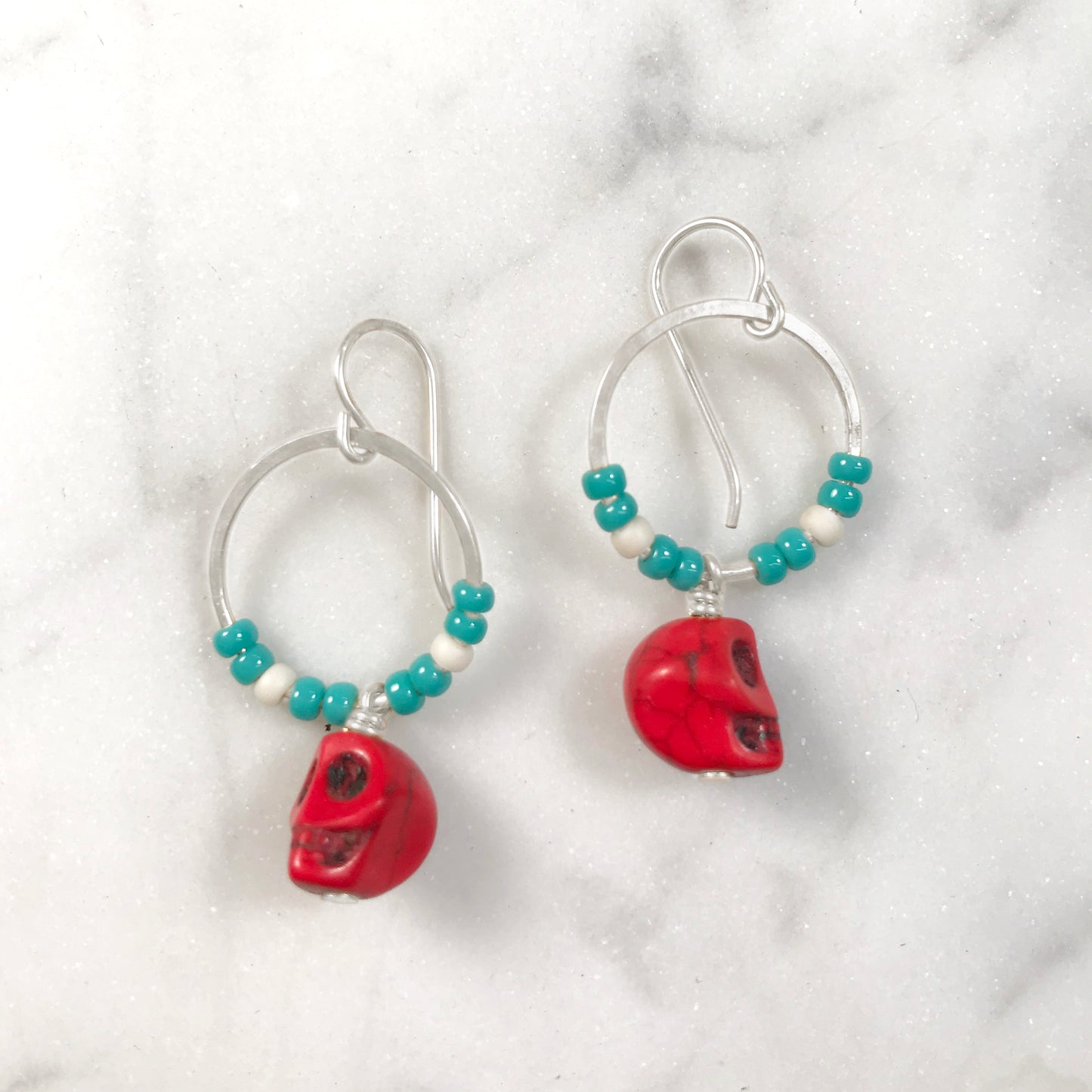 Red skull earrings