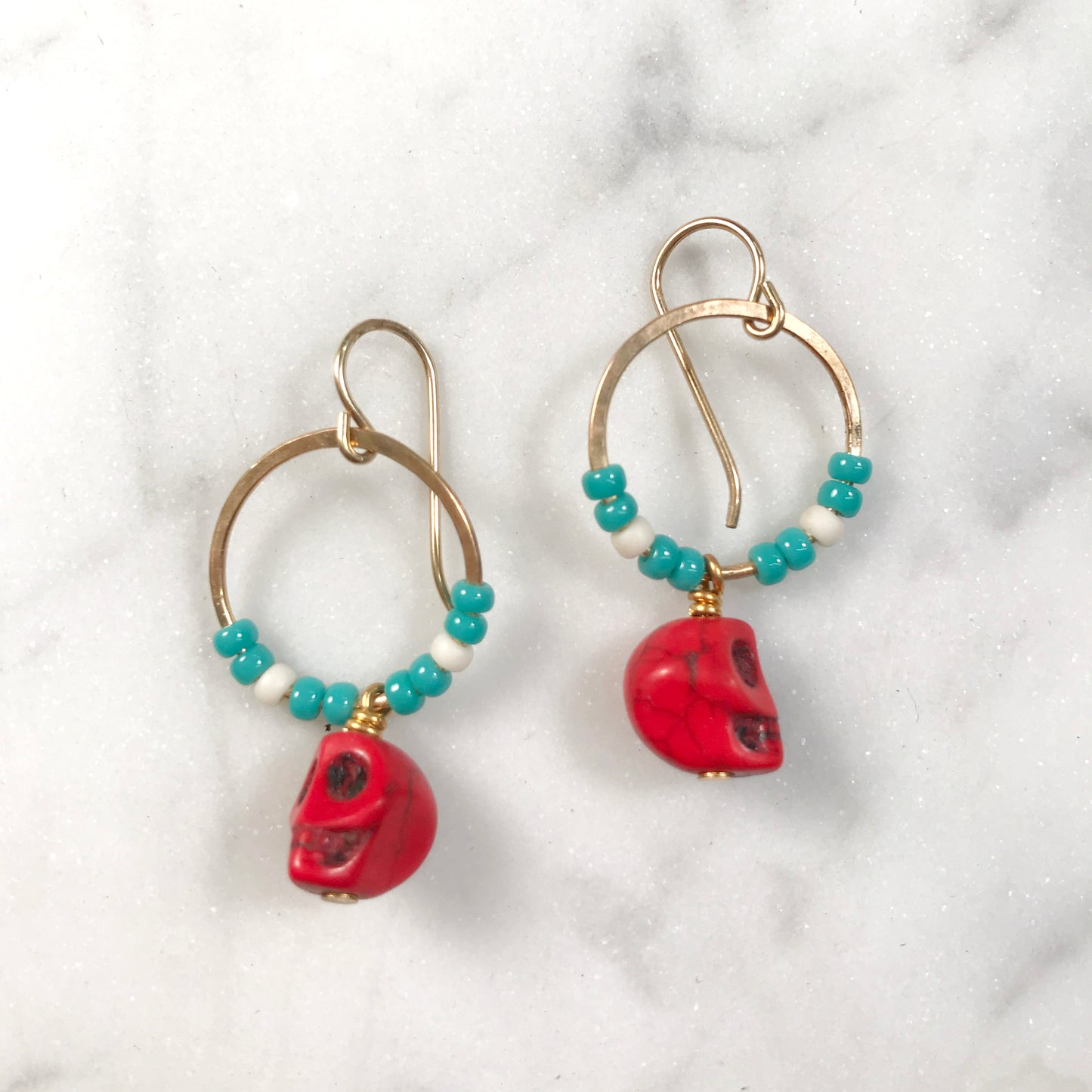 Red skull earrings