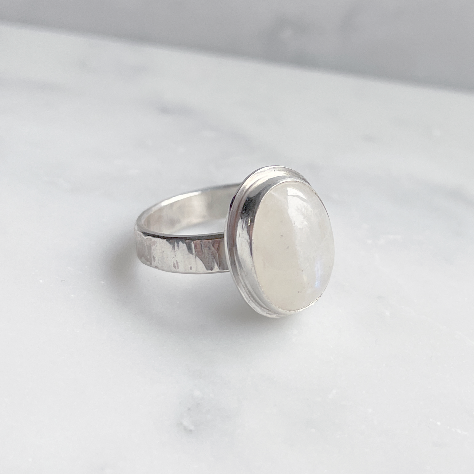 15x10mm oval moonstone ring in silver side view