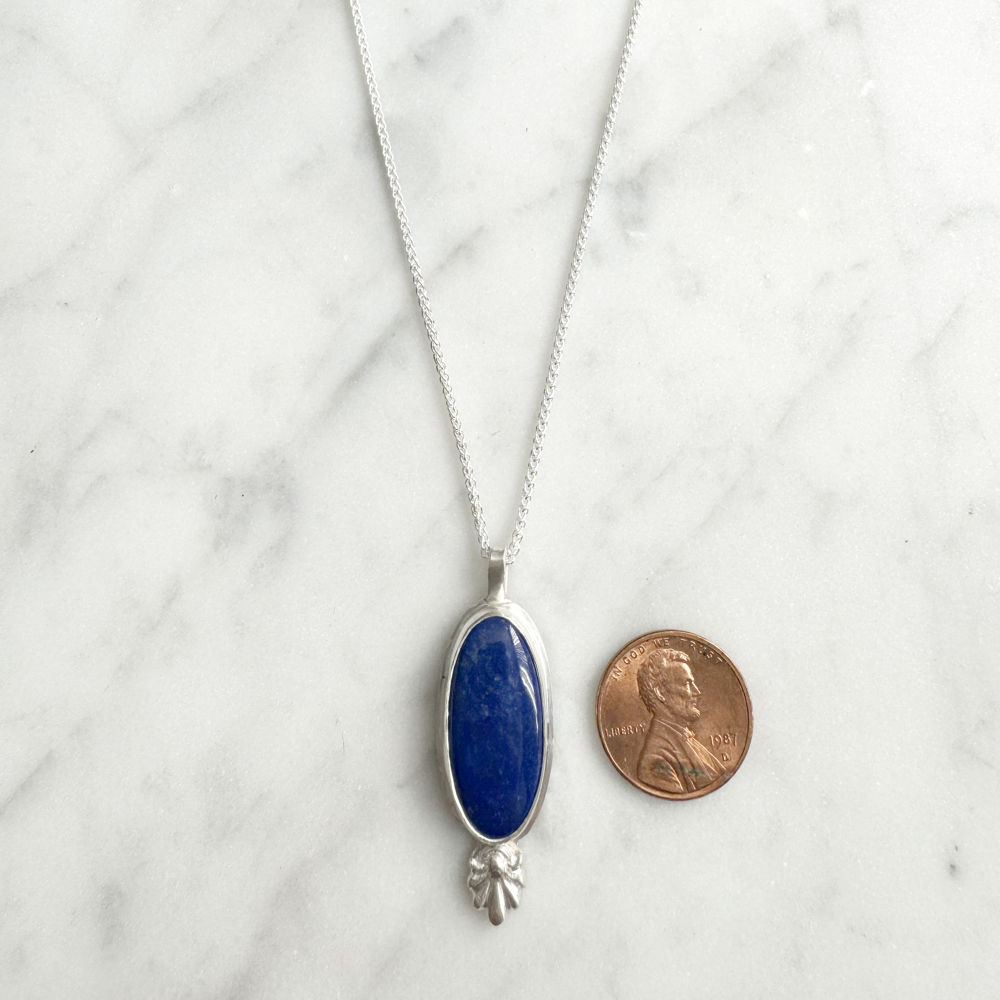 Long Oval Lapis Embelishment Necklace with penny size reference