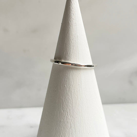 Petite faceted hammered band in silver