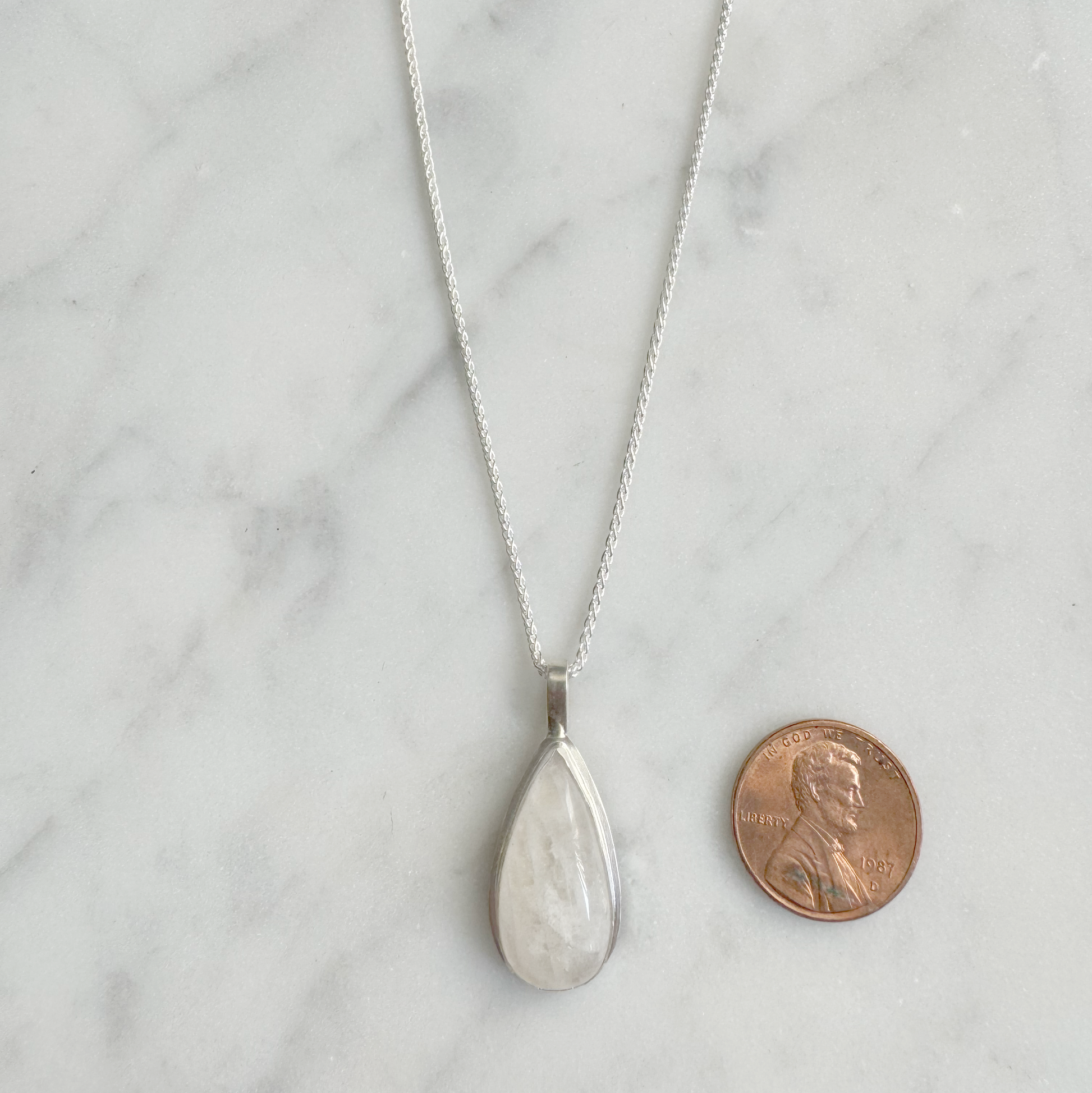Teardrop Moonstone Necklace sizing with penny